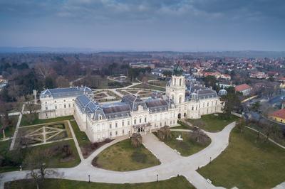 Aerial phooto of Festetics Castle in Keszthely, Hungary.A kastély és környéke madártávlatból. A Festetics-kastély Keszthely kiemelkedő jelentőségű műemléke. Építése még a 18. század közepén kezdődött el, ám csak az 1880-as években, nagyszabású átépítés és bővítés után nyerte el végleges formáját.-stock-photo