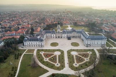 Aerial phooto of Festetics Castle in Keszthely, Hungary.A kastély és környéke madártávlatból. A Festetics-kastély Keszthely kiemelkedő jelentőségű műemléke. Építése még a 18. század közepén kezdődött el, ám csak az 1880-as években, nagyszabású átépítés és bővítés után nyerte el végleges formáját.-stock-photo