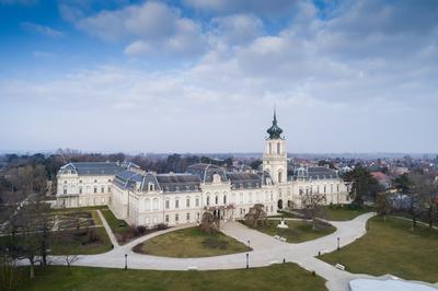 Aerial phooto of Festetics Castle in Keszthely, Hungary.A kastély és környéke madártávlatból. A Festetics-kastély Keszthely kiemelkedő jelentőségű műemléke. Építése még a 18. század közepén kezdődött el, ám csak az 1880-as években, nagyszabású átépítés és bővítés után nyerte el végleges formáját.-stock-photo