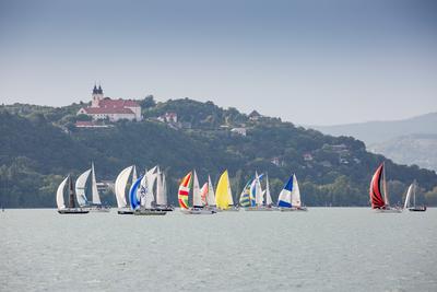 SZANTOD - JULY 18 : Sailing boats compete on 51.th Kekszalag championship at the Lake Balaton on 18 July 2019 in Szantod, Hungary.-stock-photo