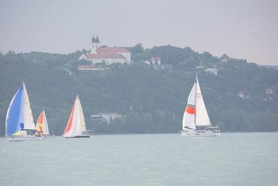 SZANTOD - JULY 18 : Sailing boats compete on 51.th Kekszalag championship at the Lake Balaton on 18 July 2019 in Szantod, Hungary.-stock-photo