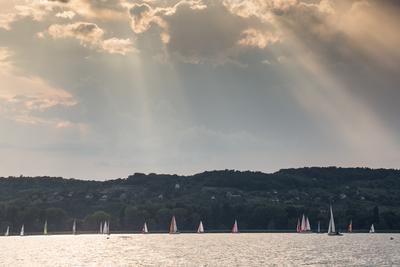 SZANTOD - JULY 18 : Sailing boats compete on 51.th Kekszalag championship at the Lake Balaton on 18 July 2019 in Szantod, Hungary.-stock-photo