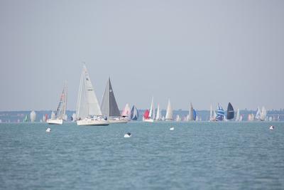 SZANTOD - JULY 18 : Sailing boats compete on 51.th Kekszalag championship at the Lake Balaton on 18 July 2019 in Szantod, Hungary.-stock-photo