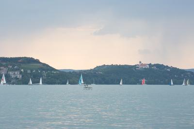 SZANTOD - JULY 18 : Sailing boats compete on 51.th Kekszalag championship at the Lake Balaton on 18 July 2019 in Szantod, Hungary.-stock-photo