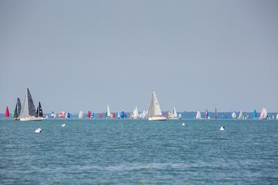 SZANTOD - JULY 18 : Sailing boats compete on 51.th Kekszalag championship at the Lake Balaton on 18 July 2019 in Szantod, Hungary.-stock-photo