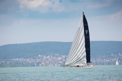 SZANTOD - JULY 18 : Sailing boats compete on 51.th Kekszalag championship at the Lake Balaton on 18 July 2019 in Szantod, Hungary.-stock-photo