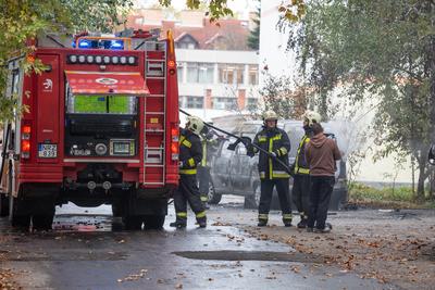 KAPOSVAR, HUNGARY - OCT 30: Firefighters help burning car on Ott.30, 2017 on  Kaposvar, Hungary.-stock-photo