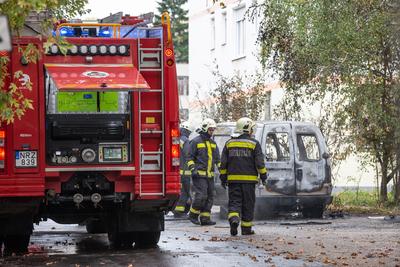 KAPOSVAR, HUNGARY - OCT 30: Firefighters help burning car on Ott.30, 2017 on  Kaposvar, Hungary.-stock-photo