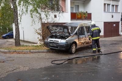 KAPOSVAR, HUNGARY - OCT 30: Firefighters help burning car on Ott.30, 2017 on  Kaposvar, Hungary.-stock-photo