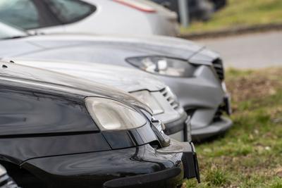 many parking cars in an outdoor garage-stock-photo