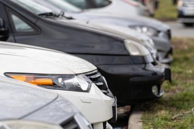 many parking cars in an outdoor garage-stock-photo