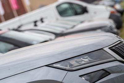 many parking cars in an outdoor garage-stock-photo