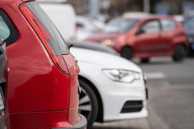 many parking cars in an outdoor garage-stock-photo