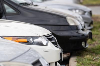 many parking cars in an outdoor garage-stock-photo