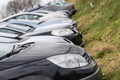 many parking cars in an outdoor garage-stock-photo