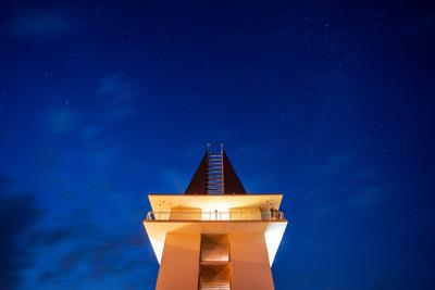 tower in Poroszlo with night sky-stock-photo