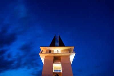 tower in Poroszlo with night sky-stock-photo