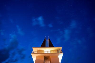 tower in Poroszlo with night sky-stock-photo