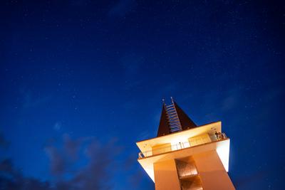 tower in Poroszlo with night sky-stock-photo