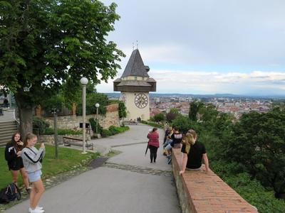 Tourists at Clock Tower - Graz - Austria-stock-photo