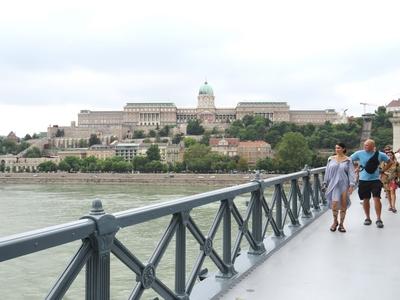 Tourists on the rebuilt Chain Bridge - Castle of Buda - Budapest-stock-photo