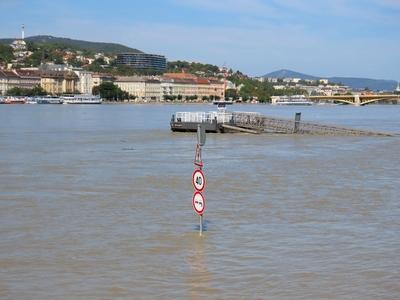 Submerged boat harbor bridge - Overflowed Danube river - Budapest - Cyclone Boris-stock-photo