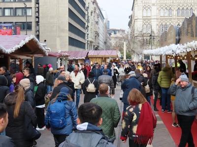 People at the Christmas market in Szent István square, in front of the Basilica - Budapest-stock-photo