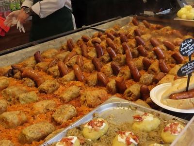 Gourmet food at the Vörösmarty square Christmas market - Stuffed cabbage and fried sausage - Budapest-stock-photo