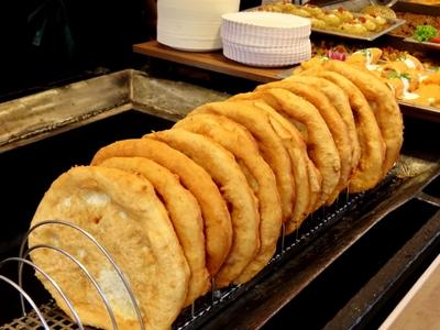 Lángos at the Vörösmarty square Christmas market - Budapest-stock-photo