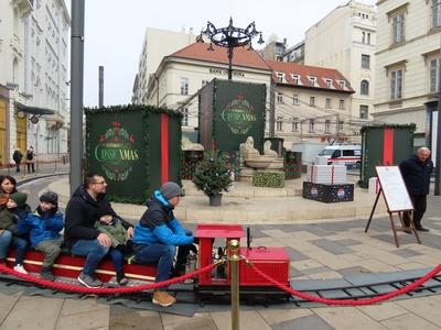 Christmas atmosphere in downtown Budapest - Small railway on Vörösmarty Square-stock-photo