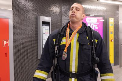 Firemen metro stair running competition in Budapest-stock-photo