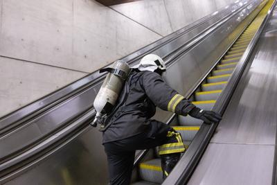 Firemen metro stair running competition in Budapest-stock-photo