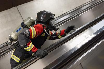 Firemen metro stair running competition in Budapest-stock-photo