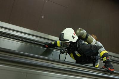 Firemen metro stair running competition in Budapest-stock-photo