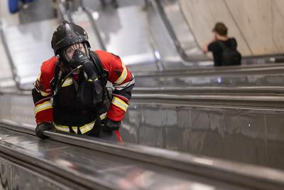 Firemen metro stair running competition in Budapest-stock-photo