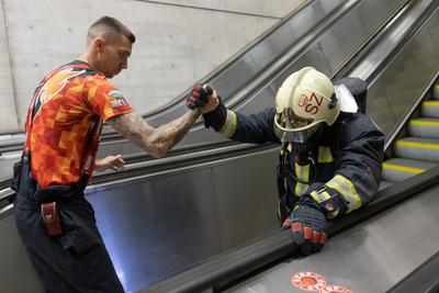 Firemen metro stair running competition in Budapest-stock-photo