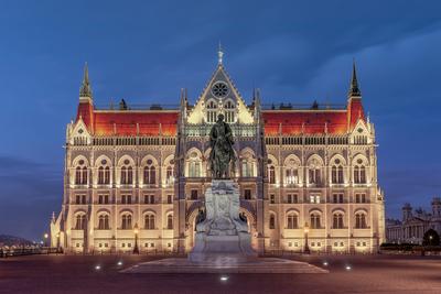 Night view of the illuminated building of the hungarian parliament in budapest. I took this photo from unusual viewpoint.-stock-photo